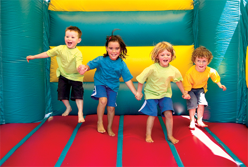 The four youngsters failed to realize the jumping at once would fail to launch them free of the von trapp bouncy castle.  